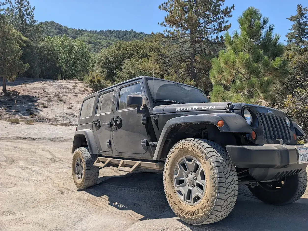 Black Rubicon cresting a rocky ridge on the San Jacinto creek route