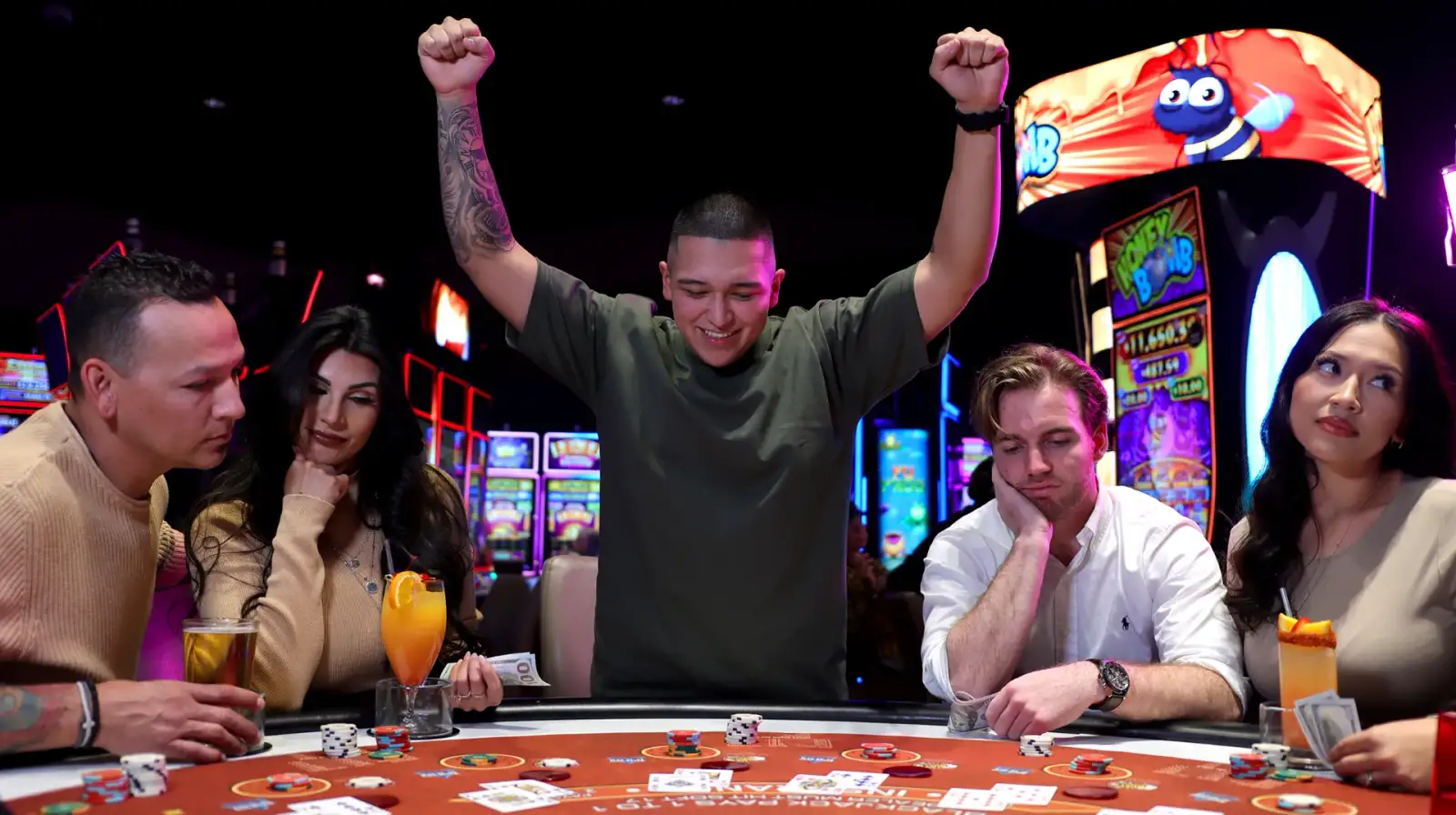 Players celebrating a win at a table game at the Cahuilla Casino